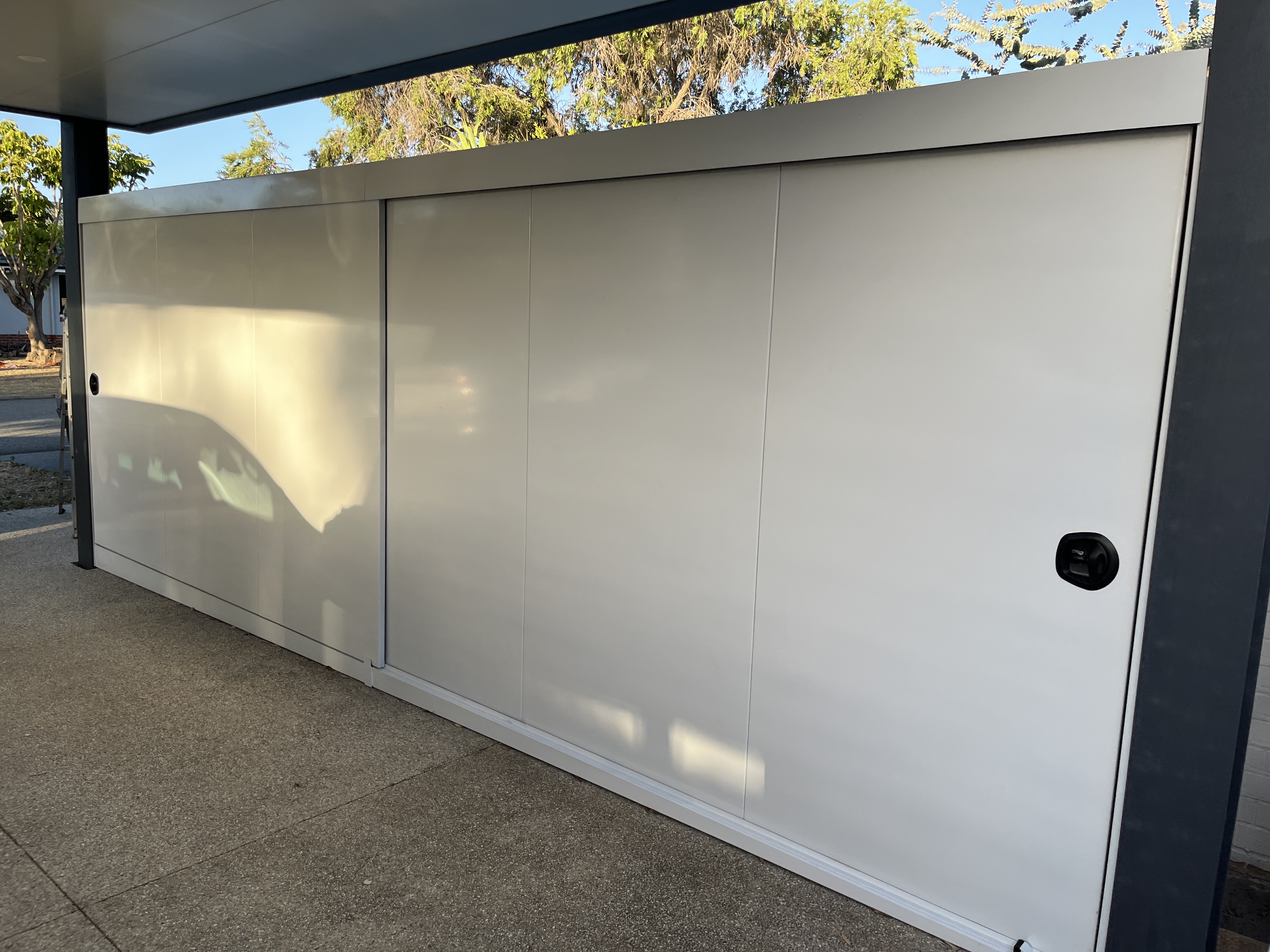 Large white custom sliding panel or gate