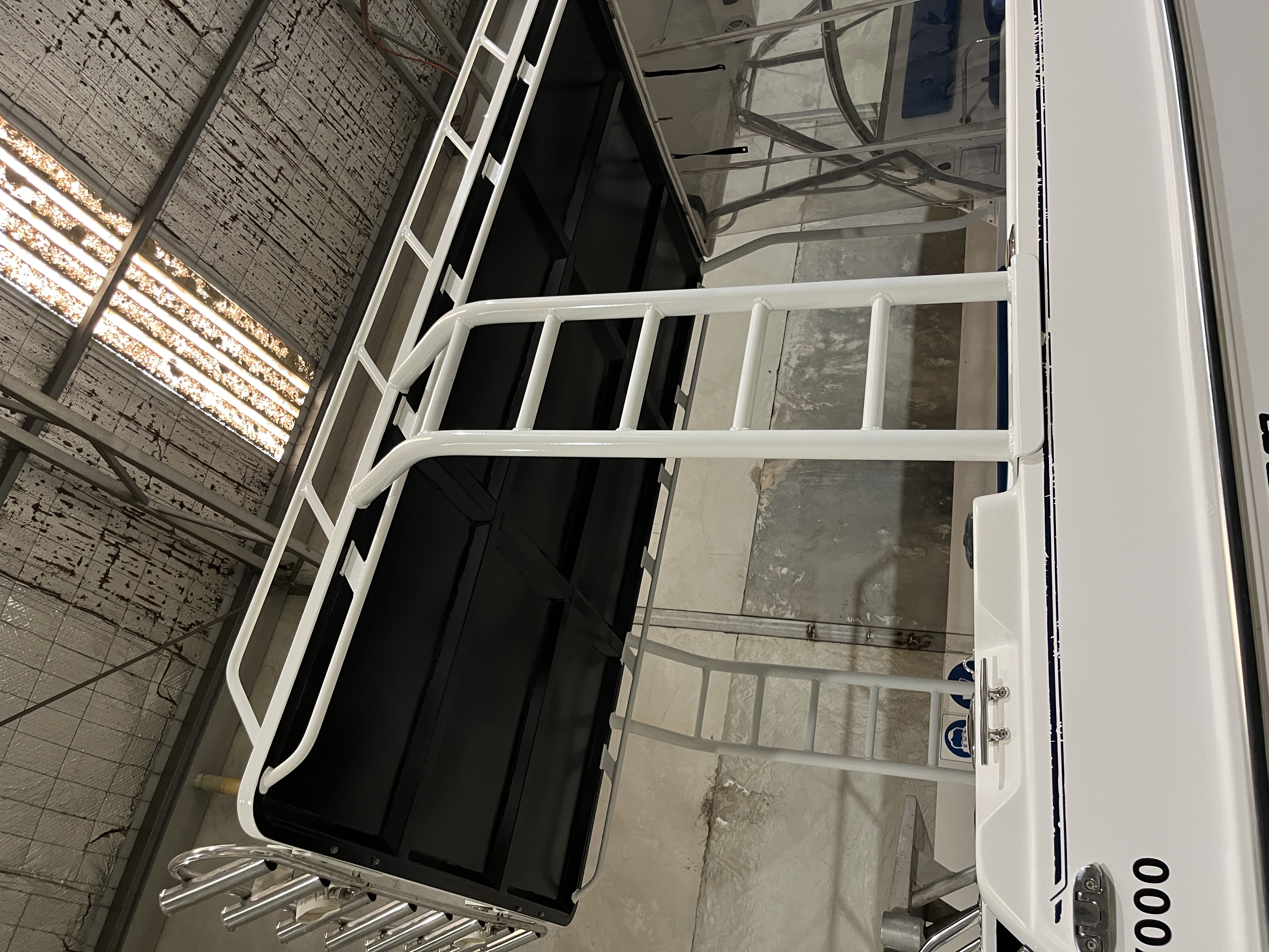 Custom white aluminium boat canopy and rail frame